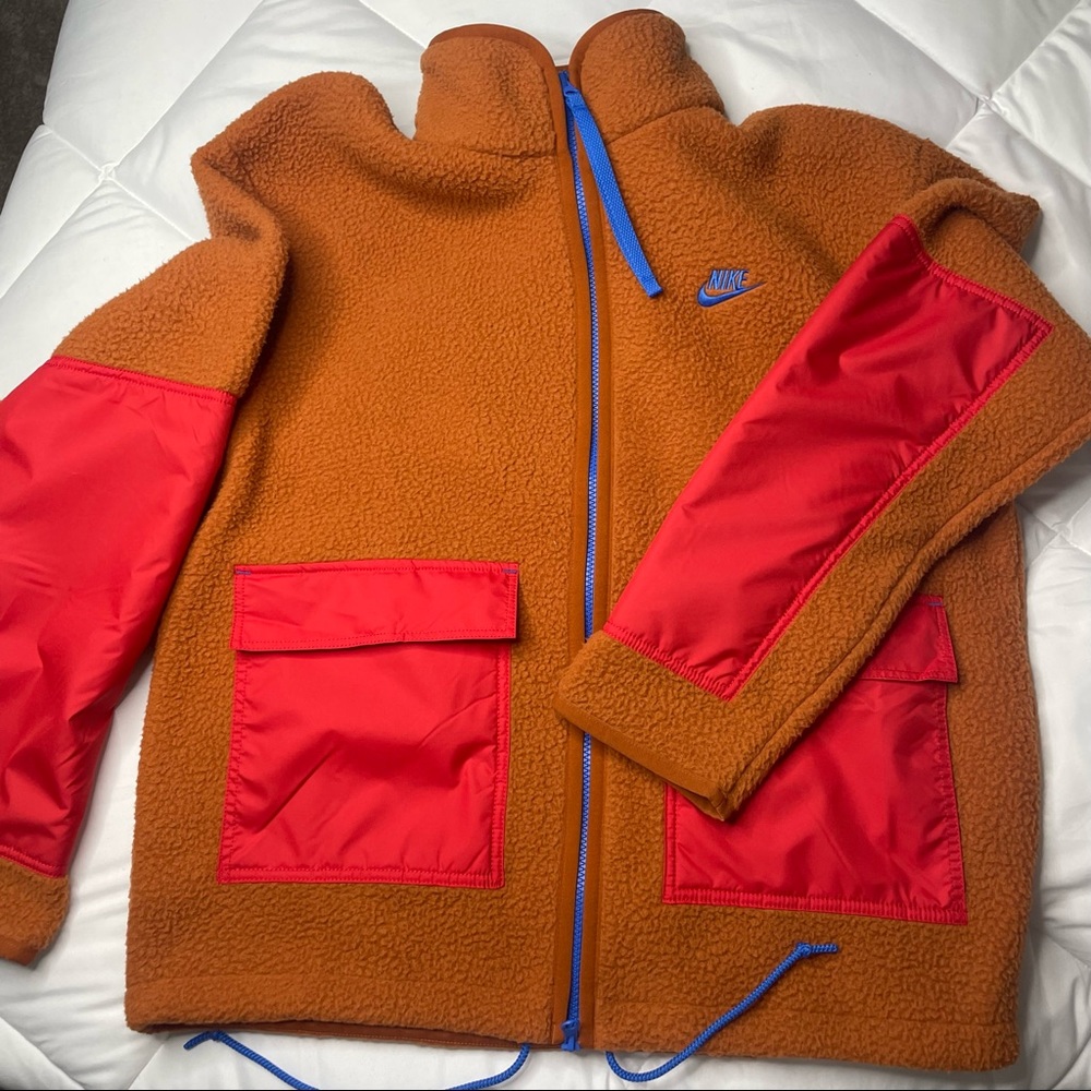 New Nike SW Sport Essentials+ Men's Fleece Full-Zip Jacket
Orange/Blue/ Red
M